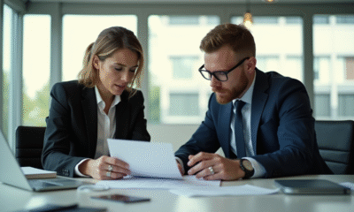 Deux professionnels en réunion dans un bureau lumineux